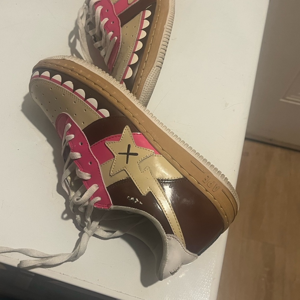 Used sneaker look like new . One spot on right sneaker.